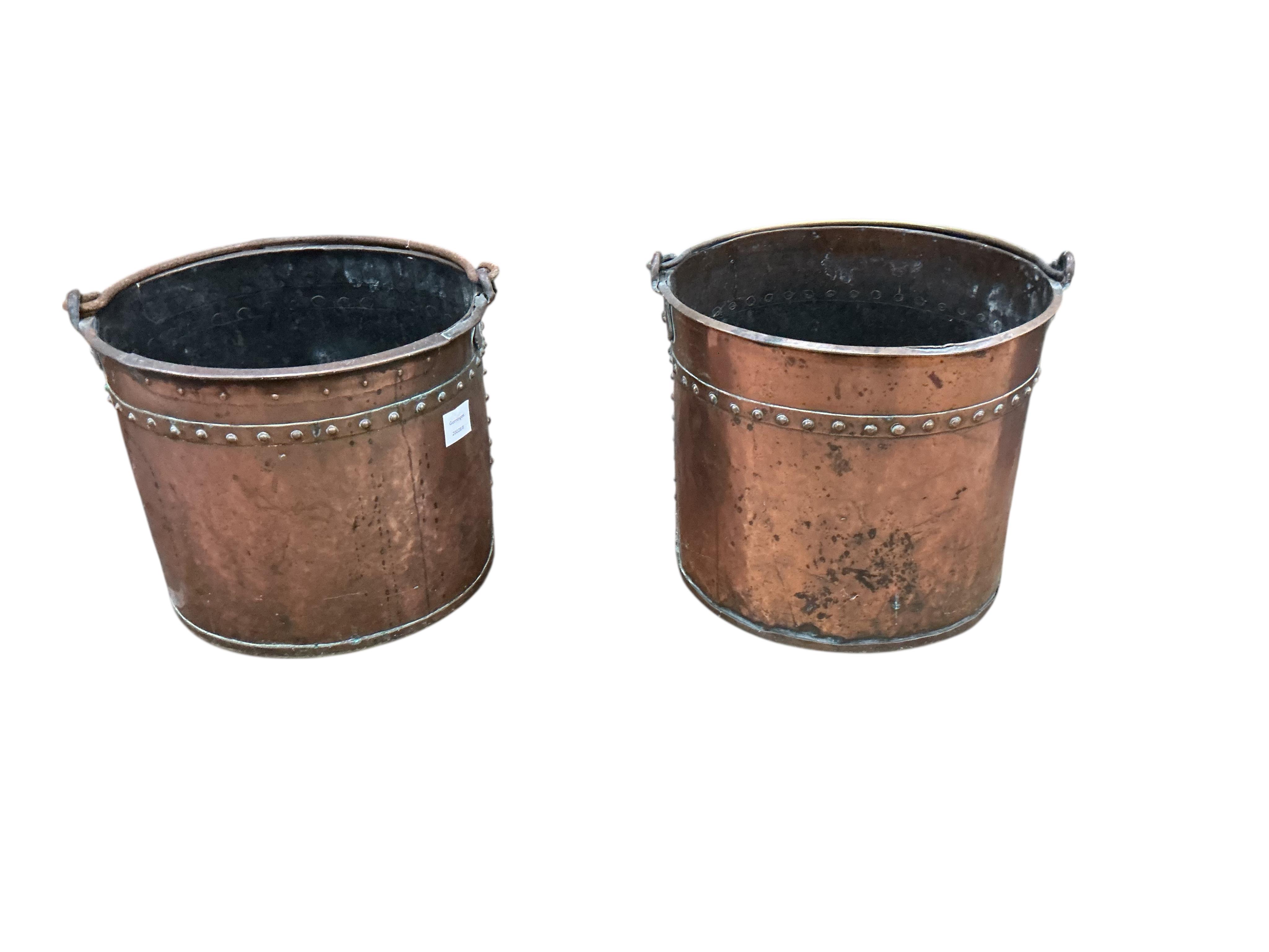 A near pair of 19th century copper coal buckets, larger diameter 35cm, height 30cm